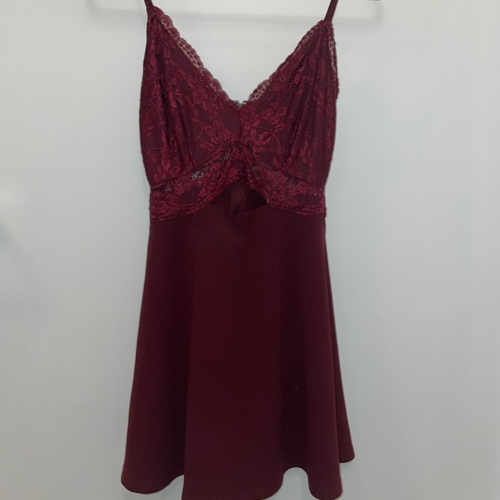 Lace mini skirt with a peek-a-boo cutout! perfect for a dance or a date night!